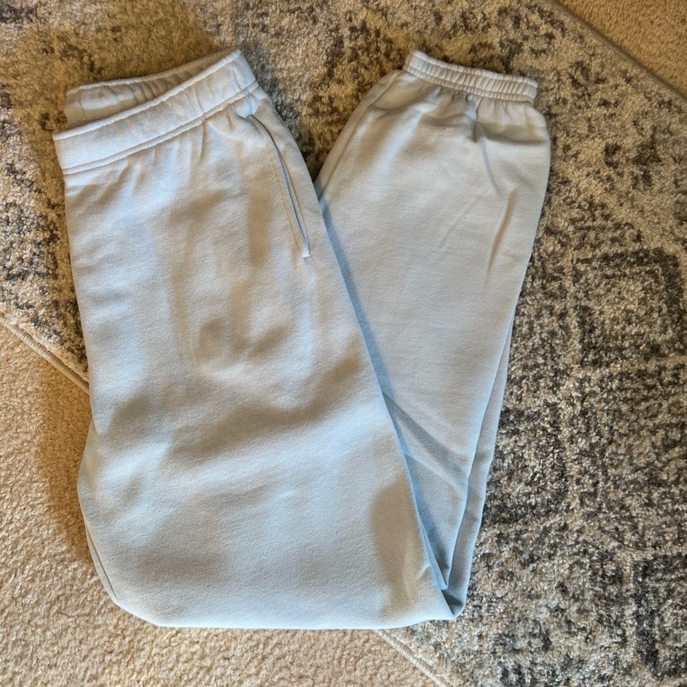 TNA CozyAF fleece sweatpants (very light baby blue)
